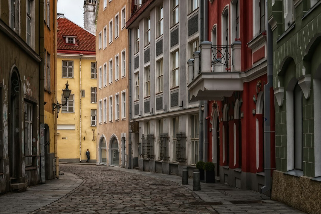 Historic European old town street with colourful tenement houses